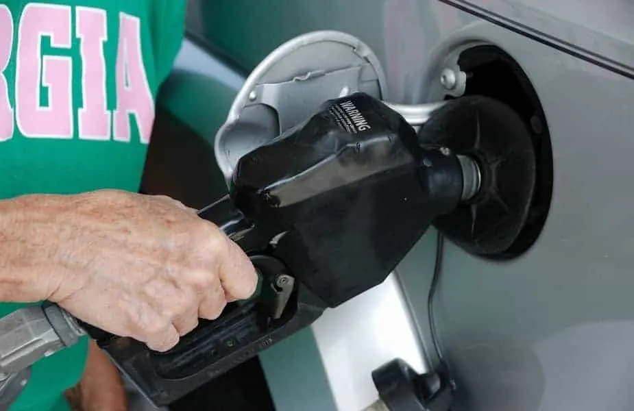 Man Pumping Gas into Car