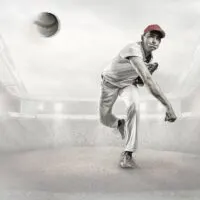 A Young Pitcher Throwing a Baseball Toward Camera