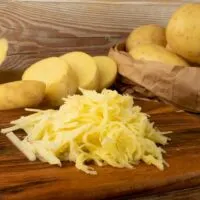 Shredded Potatoes on a Cutting Board