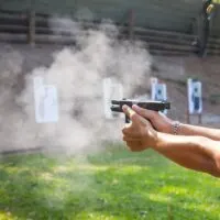 Man Test Firing a Glock 19 at a Range