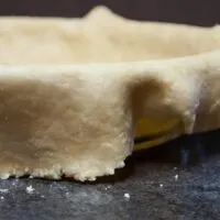 Homemade-Pie-Crust-with-Flour-on-Table