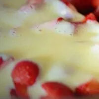 Runny-Custard-in-a-bowl-with-Strawberries
