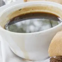 Au Jus Overflowing From a Bowl