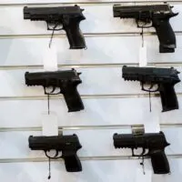 A Wall of Multiple Handguns for Sale