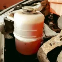 Full Power Steering Reservoir in a Vehicle