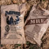 Two MRE Meals Ready to Eat Laying on the Ground