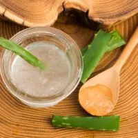 Aloe vera juice with fresh leaves