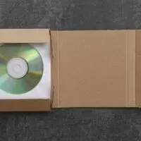 CD packed in cardboard mailer shipping box