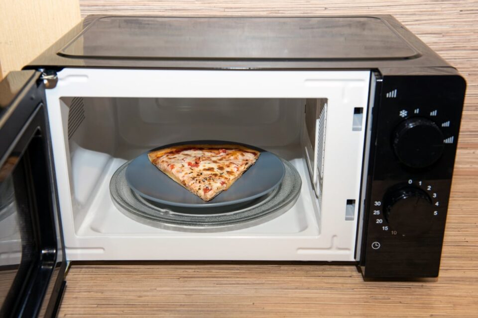 Can You Microwave Frozen Pizza? (Yes, and Here's How) - Survival Freedom