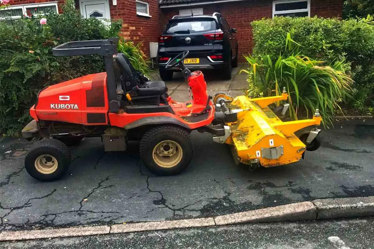 Tractor blocking a residential driveway